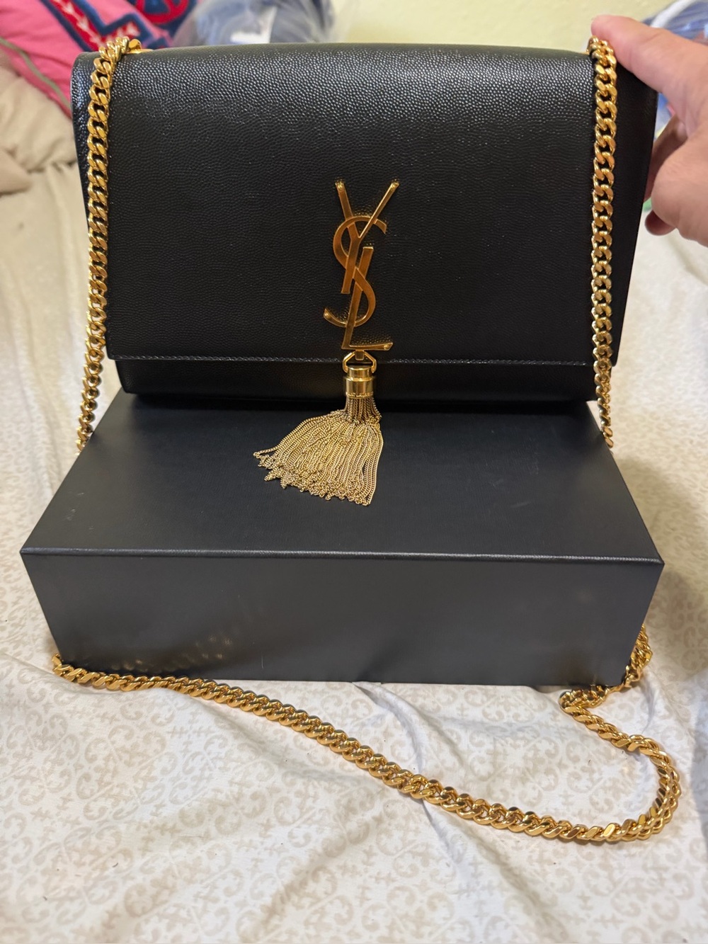 Saint Laurent Black Leather Shoulder Bag with Gold Chain and Tassel